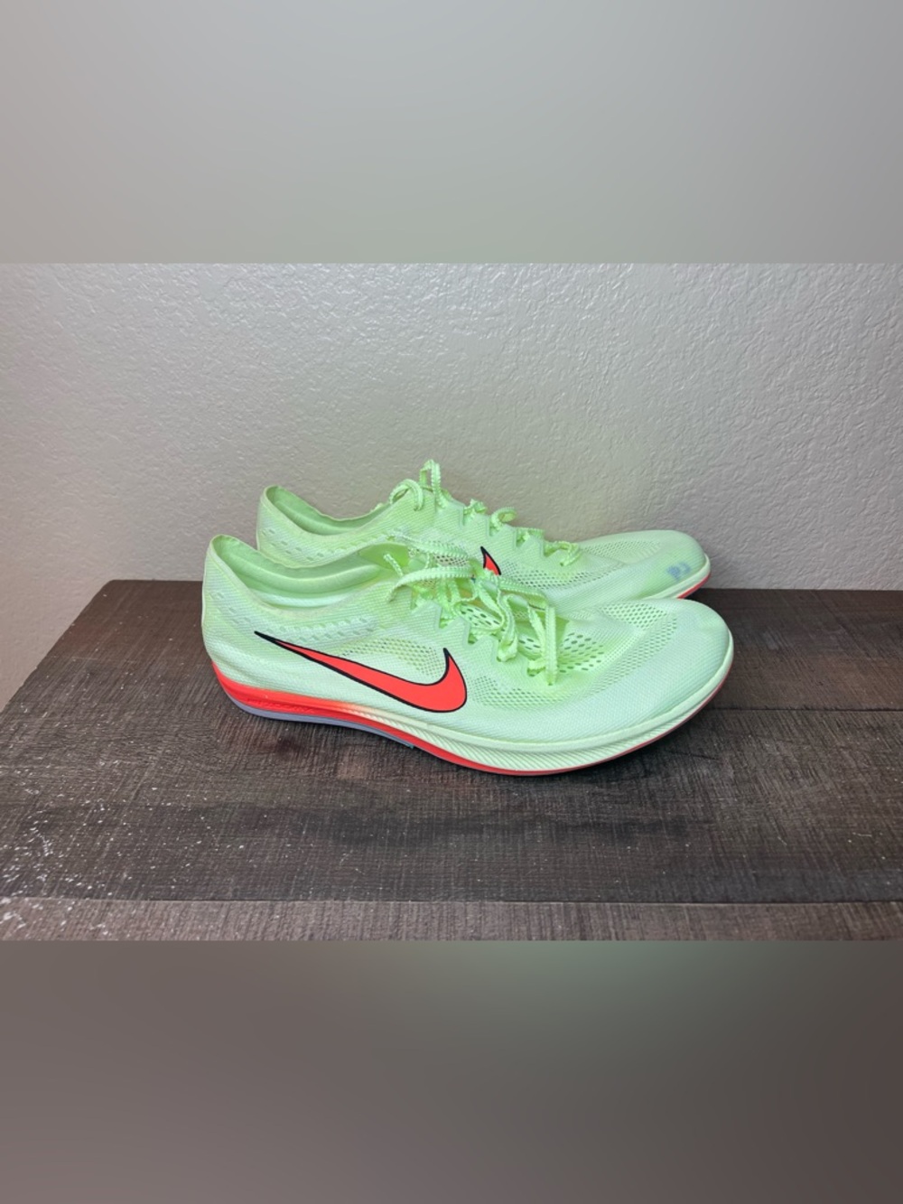 Nike ZoomX Dragonfly “Barely Volt Hyper Orange”
- Size 10.5 Men.